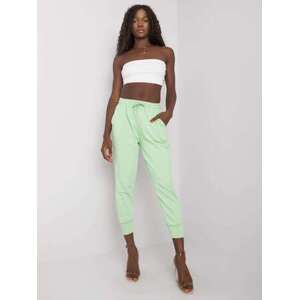 Fashionhunters Světle zelené dámské bavlněné kalhoty S/M